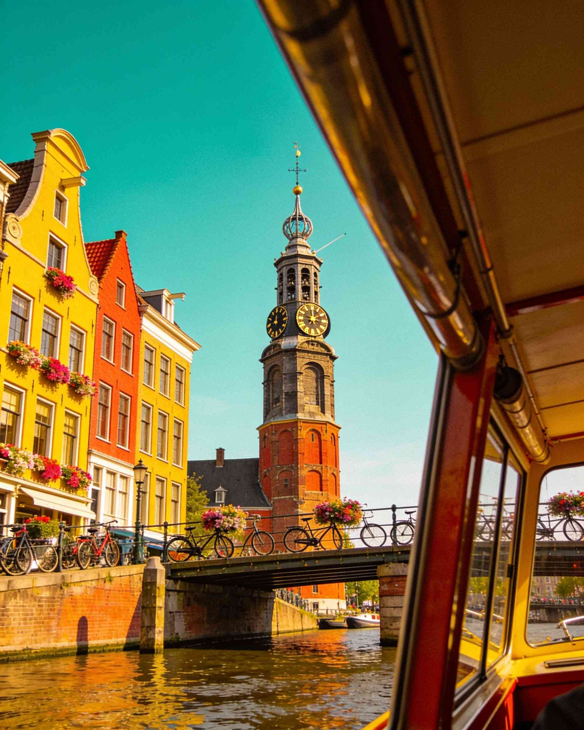 Munttoren in Amsterdam seen from a canal boat
